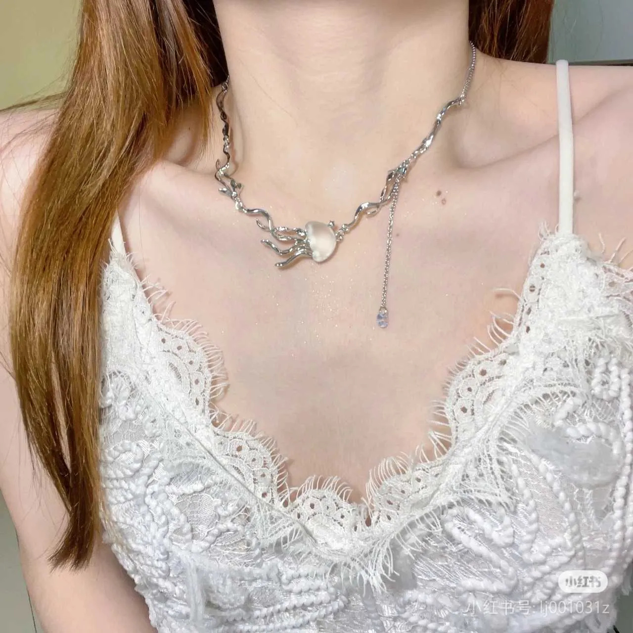 Frosted jellyfish pendant necklace and earrings in multiple colour options on a white background