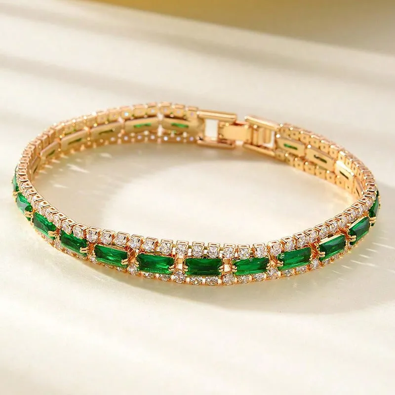 Unisex gold electroplated double-row diamond zirconia tennis chain bracelet on white background