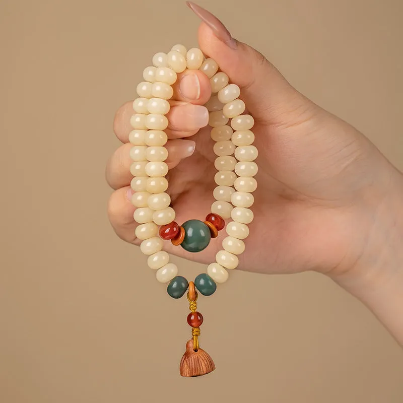 Cream topaz wooden bodhi bracelet with 6 by 9mm flat round beads for women