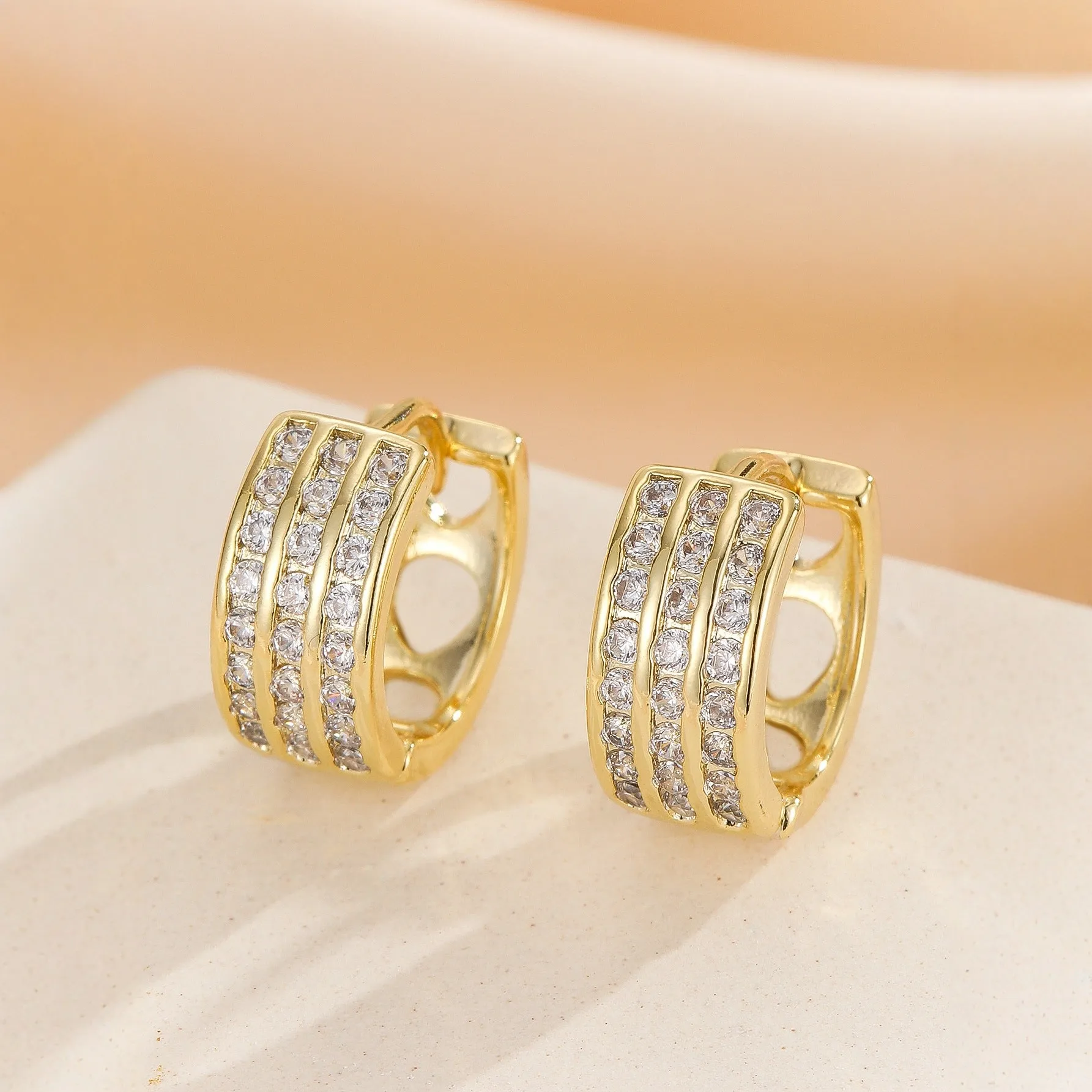 Silver-tone metal ear buckle with clear cubic zirconia stone for women, two style options available