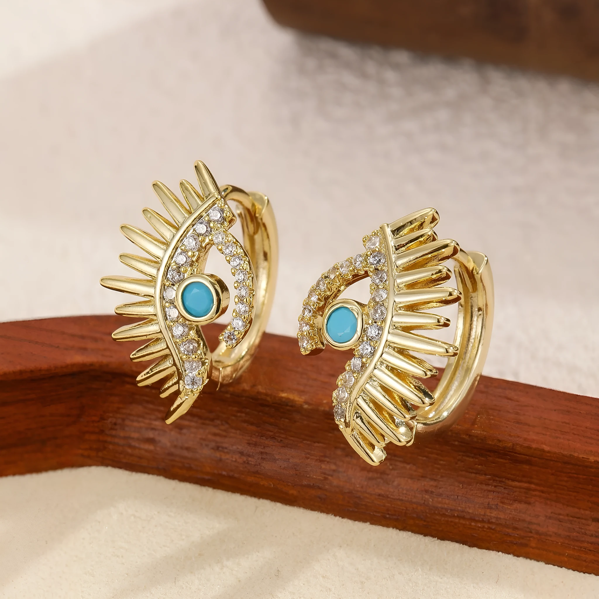 Simple Devil's Eye Earrings in lightweight resin with compact 2cm evil eye motif, available in silver and gold tones
