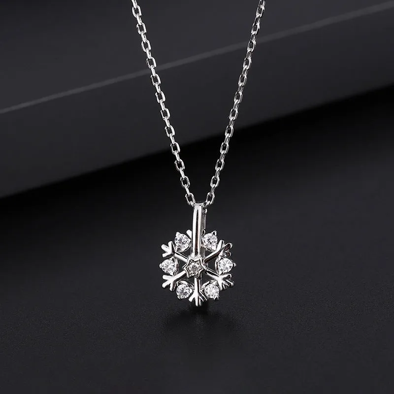 Pure silver rotating snowflake necklace with electroplated finish on adjustable cross chain for women