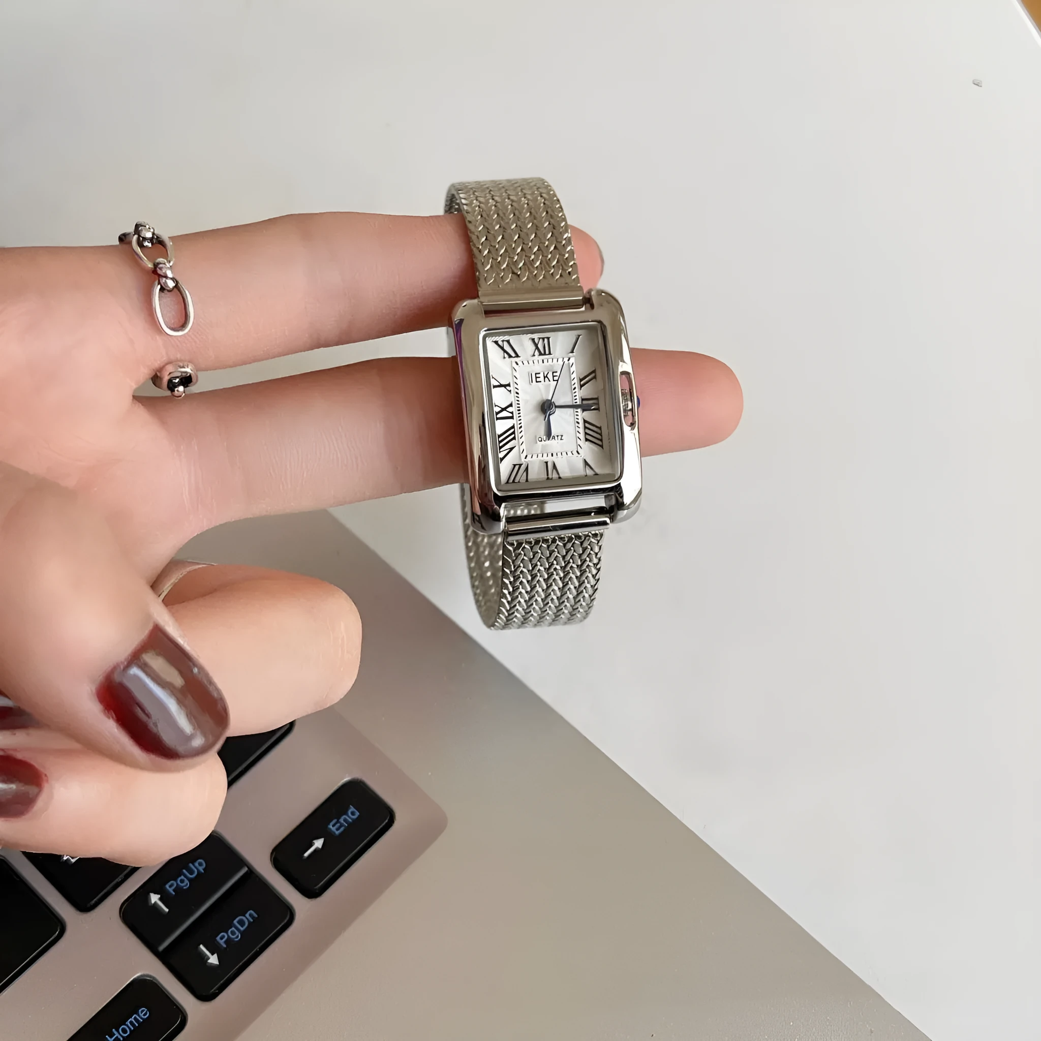 Lady's Roman retro square quartz watch with metal strap and glass face