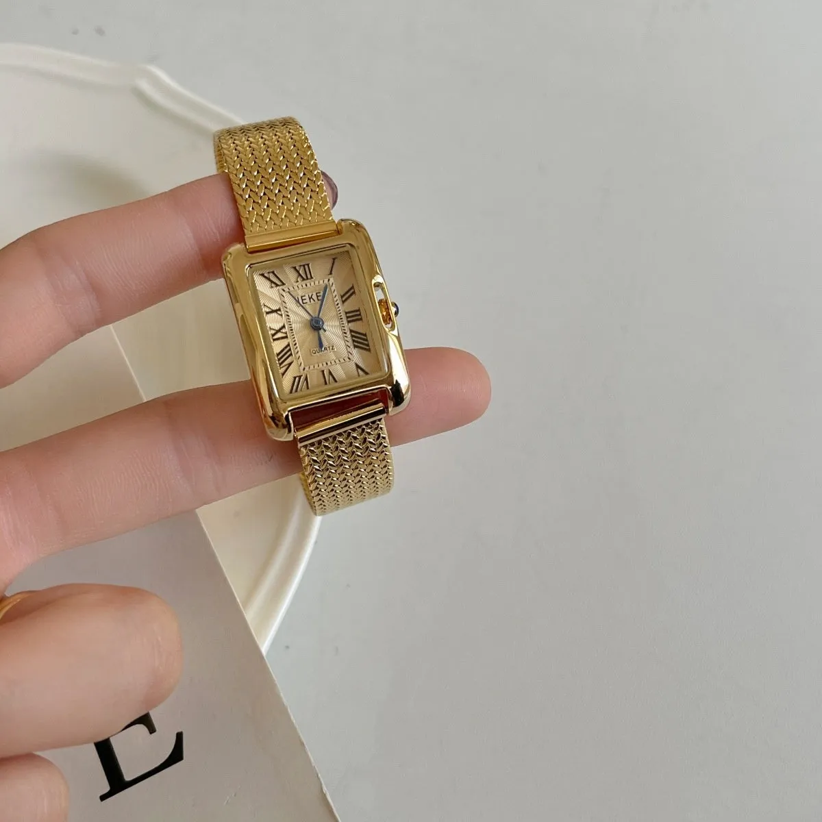 Lady's Roman retro square quartz watch with metal strap and glass face