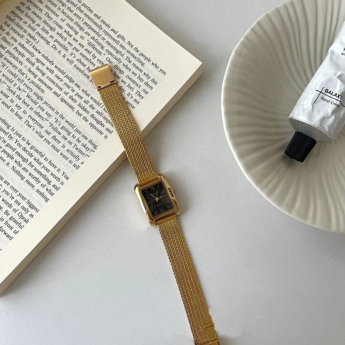 Lady's Roman retro square quartz watch with metal strap and glass face
