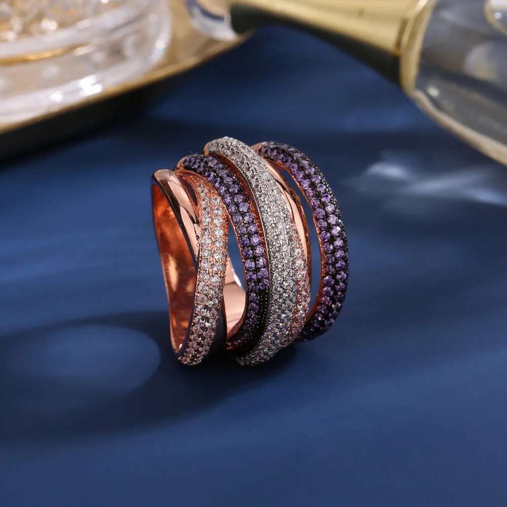 Women's geometric cross line ring with colour-separated zirconia stones in green, red, yellow, purple on a copper band