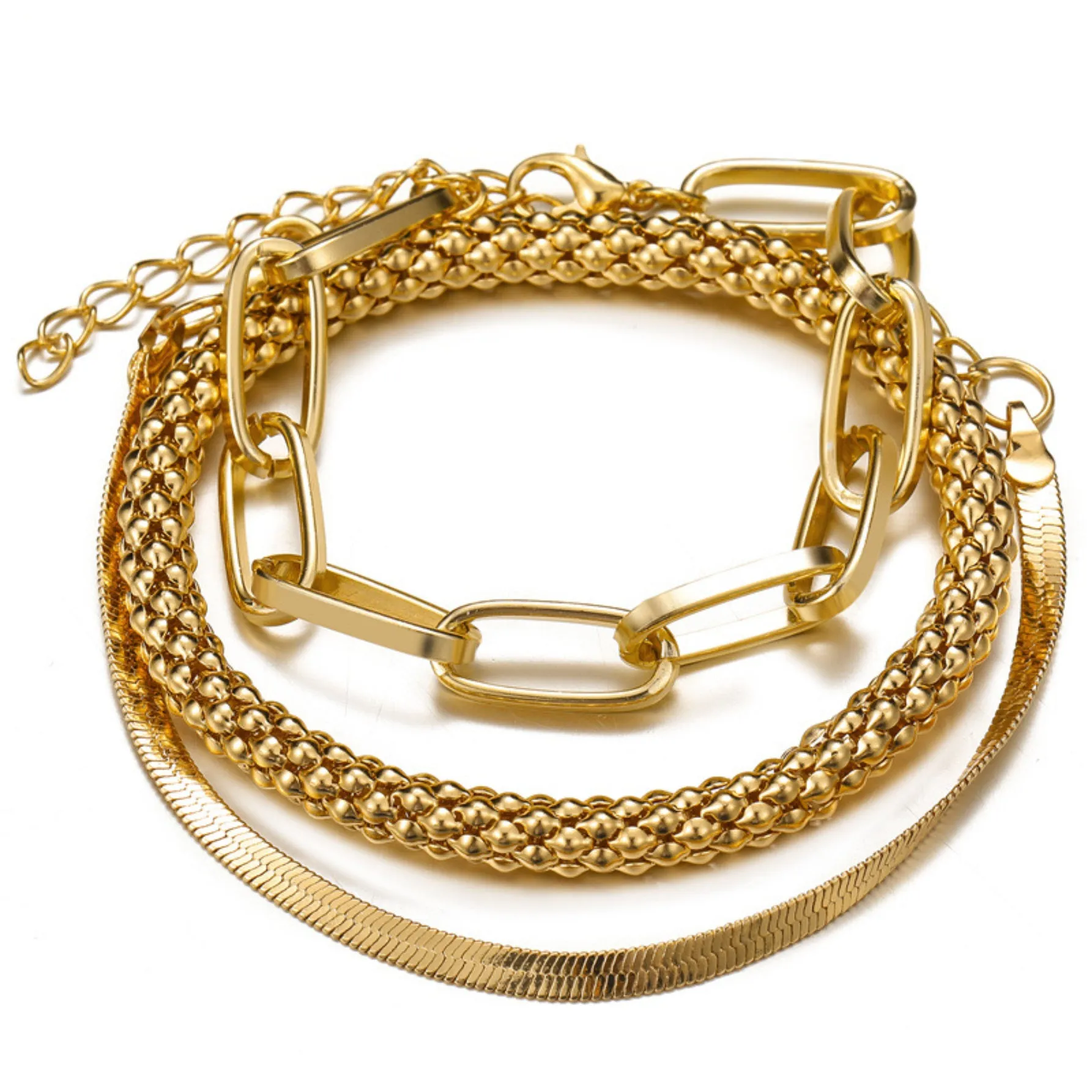 Set of three alloy snake bone chain bracelets in retro geometric design with electroplated gold finish