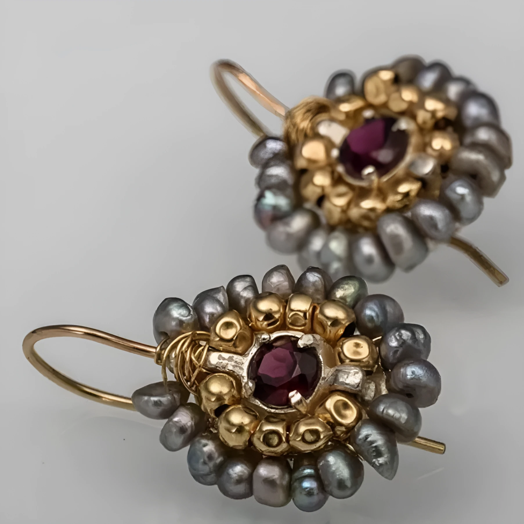 Geometric handmade woven drop earrings in gold copper with micro inlay and petal shape