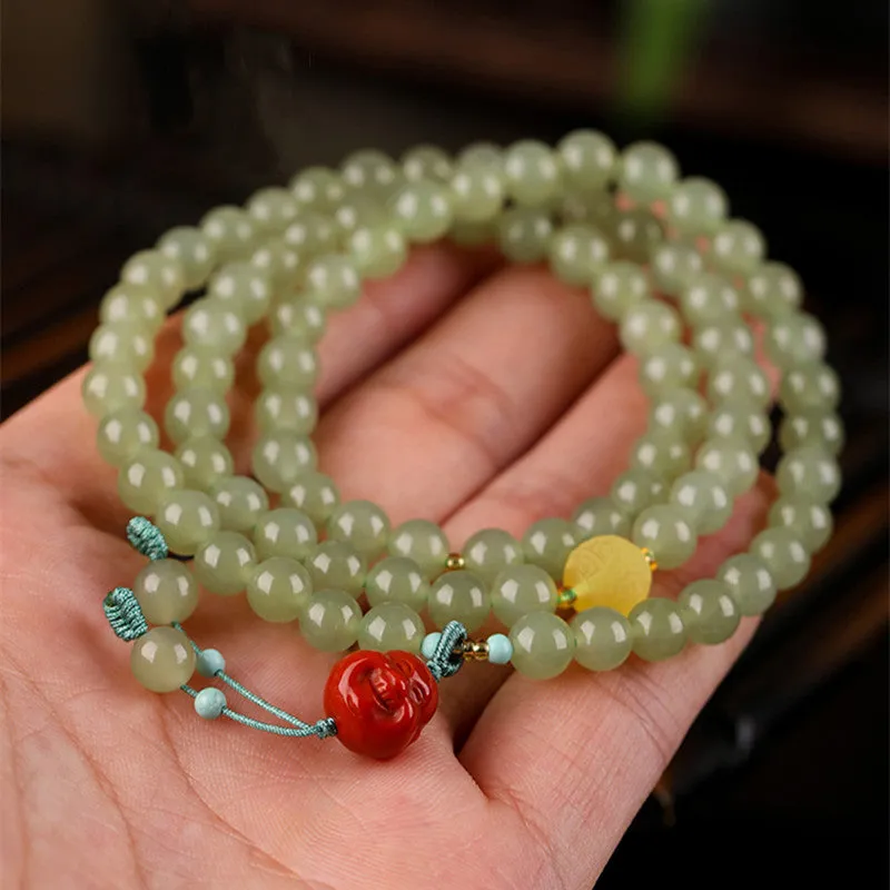 Pale blue Hetian jade bracelet with three circle design on wrist