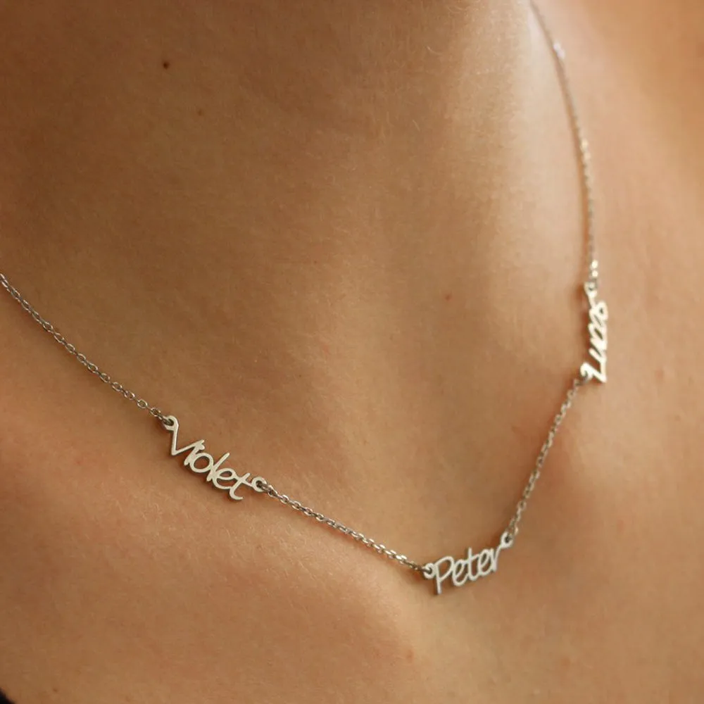 Custom stainless steel name necklace with gold plating, 4x1cm pendant on 40cm O-chain, personalised with three names