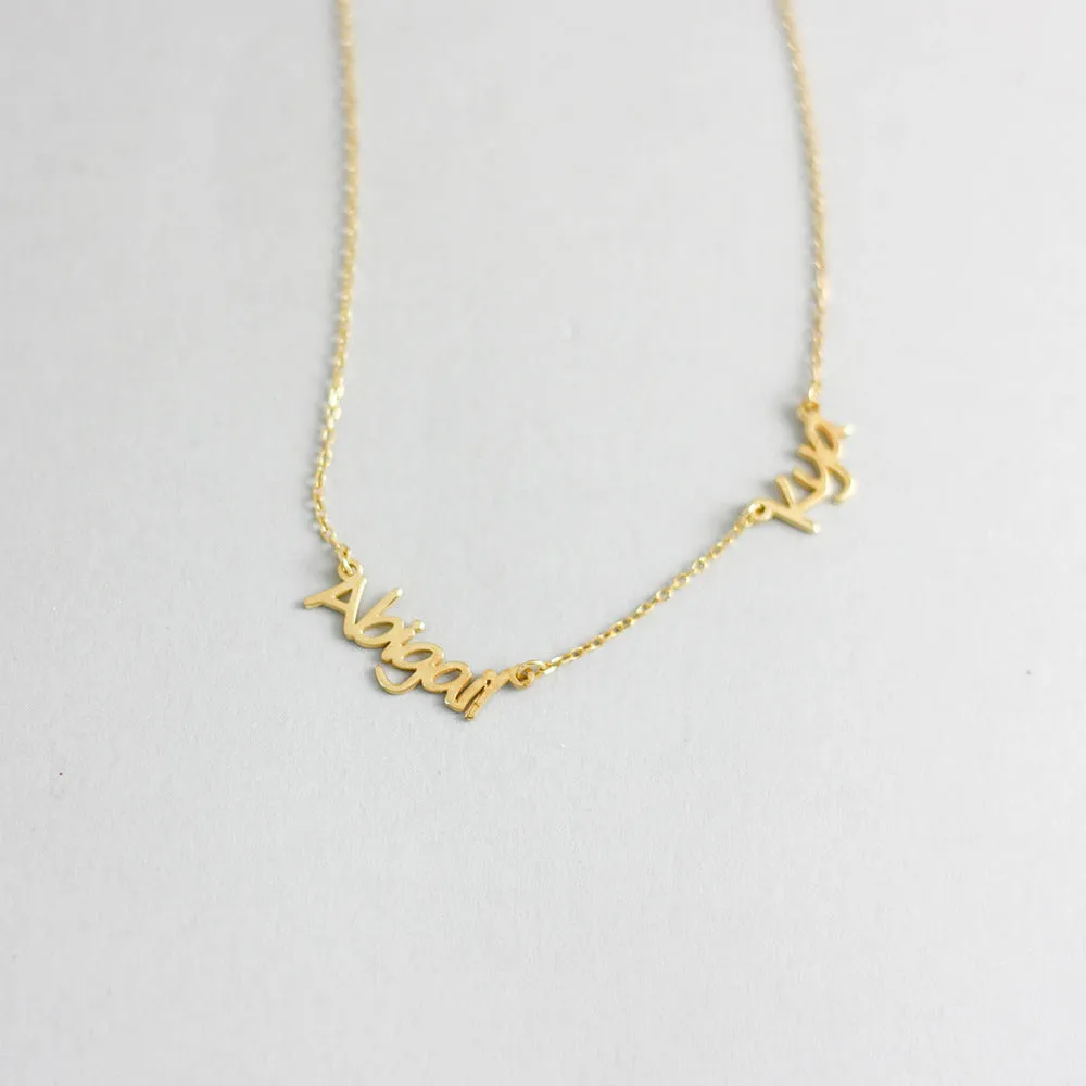 Custom stainless steel name necklace with gold plating, 4x1cm pendant on 40cm O-chain, personalised with three names