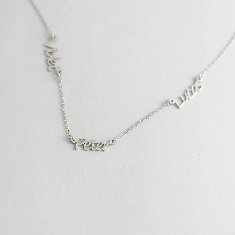 Custom stainless steel name necklace with gold plating, 4x1cm pendant on 40cm O-chain, personalised with three names