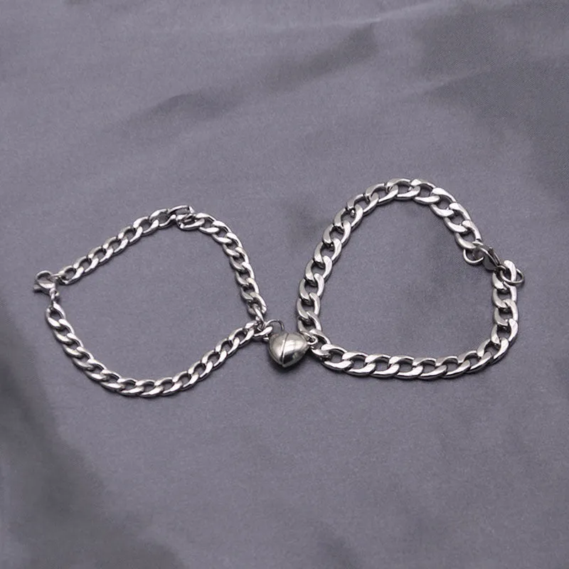 Magnetic couple bracelet set with silver heart charm on stainless steel chain
