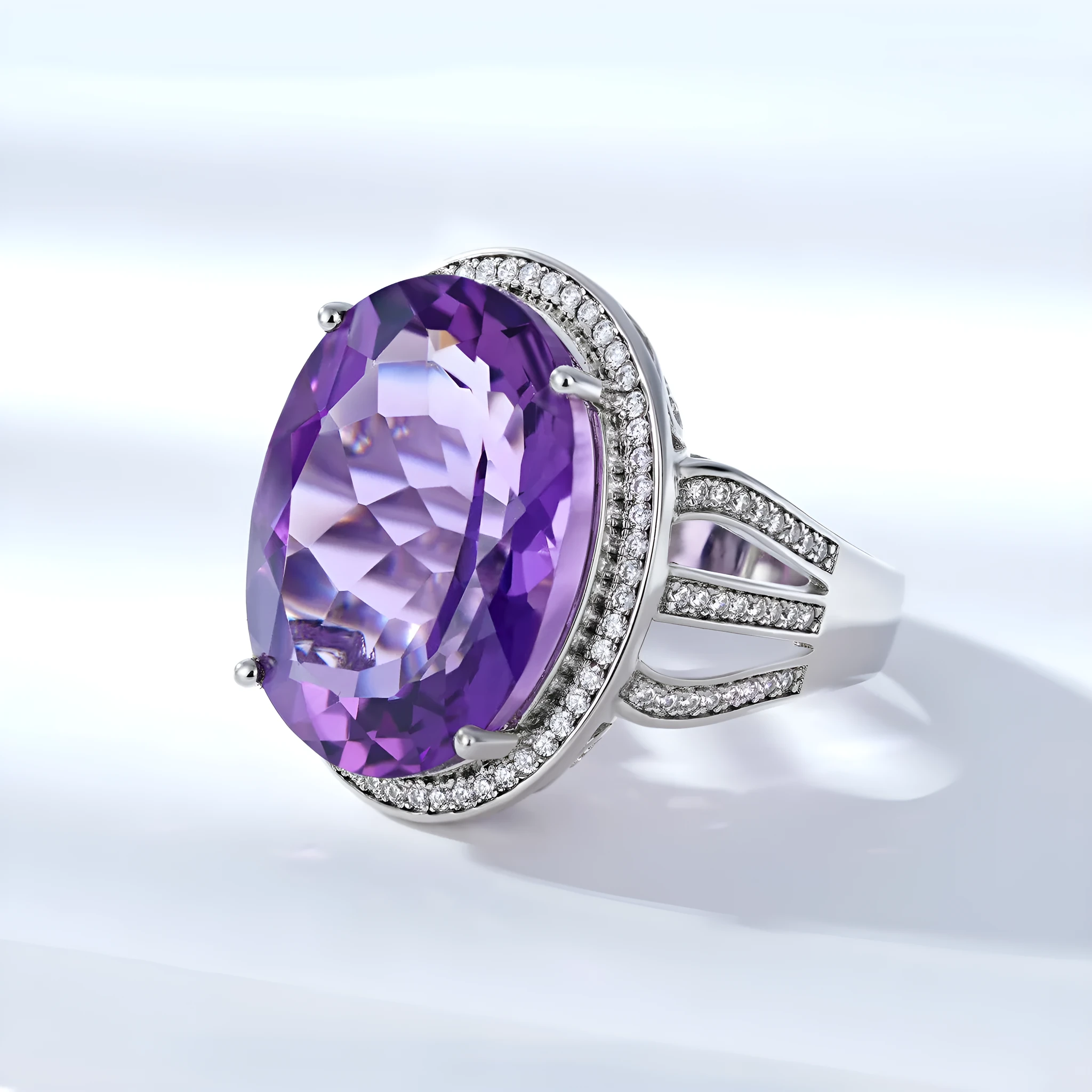 Natural amethyst ring in 925 silver with oval 19-carat stone, white finish, side view on finger