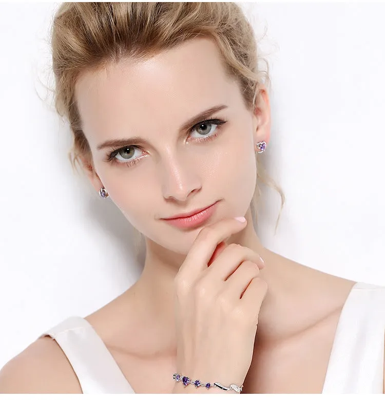 Silver heart-shaped zircon earrings for women, available in purple or white colour, with sterling silver inlay and electroplating finish.