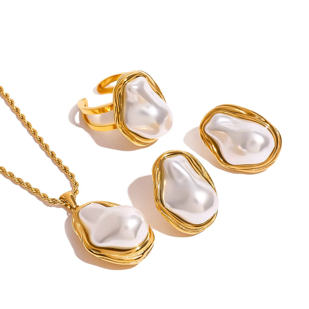 Women's stainless steel necklace with irregular mother pearl shellfish pendant on regular chain, with matching earrings and ring