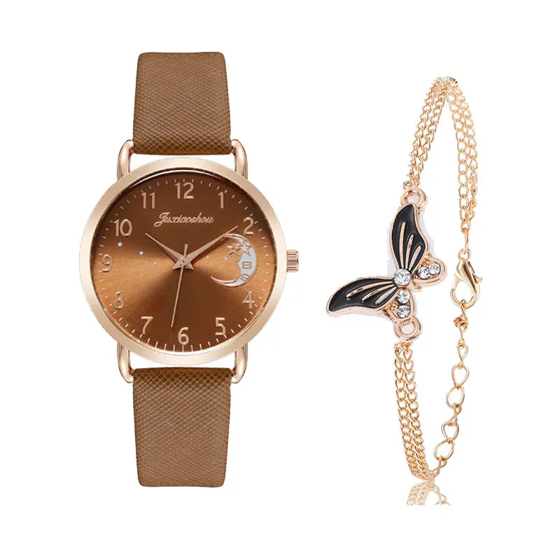 Women's quartz watch with round dial, imitation leather strap, and rose gold pin buckle on a white background.