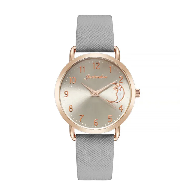 Women's quartz watch with round dial, imitation leather strap, and rose gold pin buckle on a white background.