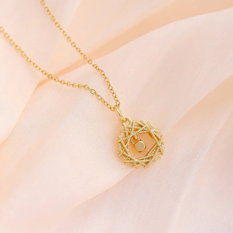 Gold circle net design necklace on a woman, titanium steel geometric pendant with O-chain style