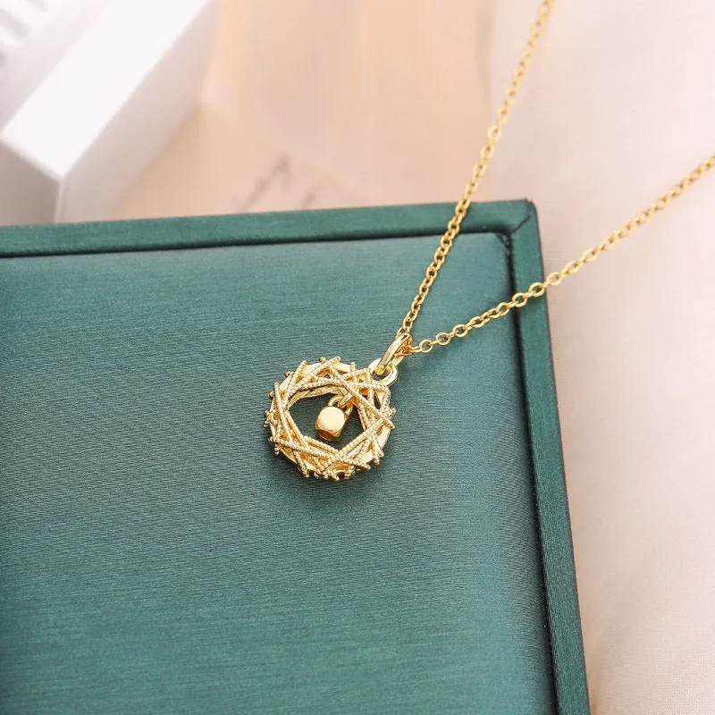 Gold circle net design necklace on a woman, titanium steel geometric pendant with O-chain style