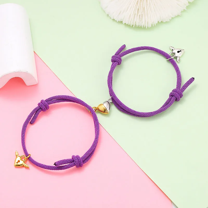 New Love Magnet couple bracelet set, heart-shaped alloy design in black and white, matching pair