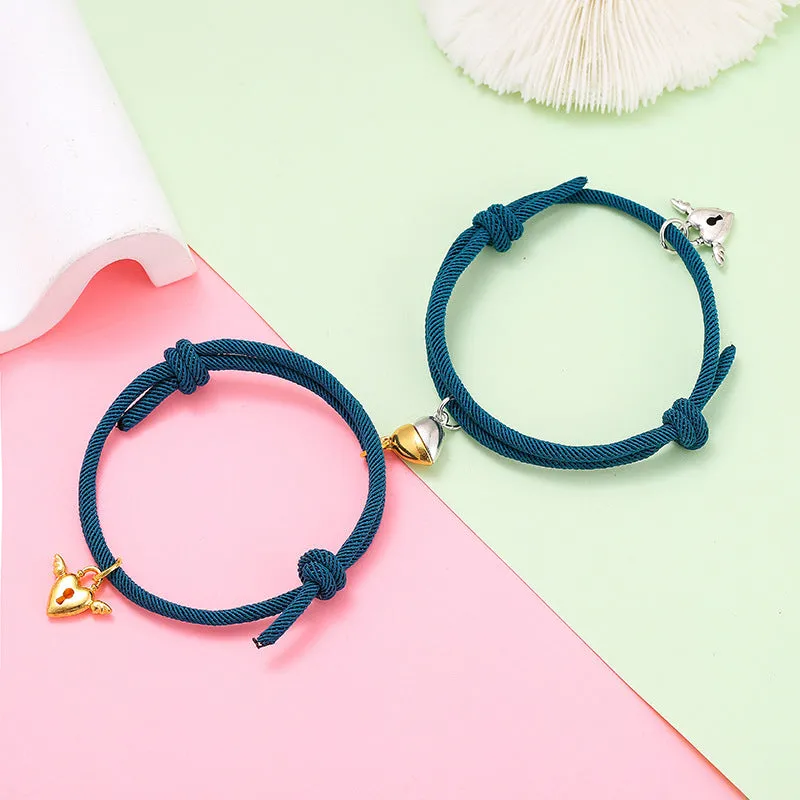 New Love Magnet couple bracelet set, heart-shaped alloy design in black and white, matching pair