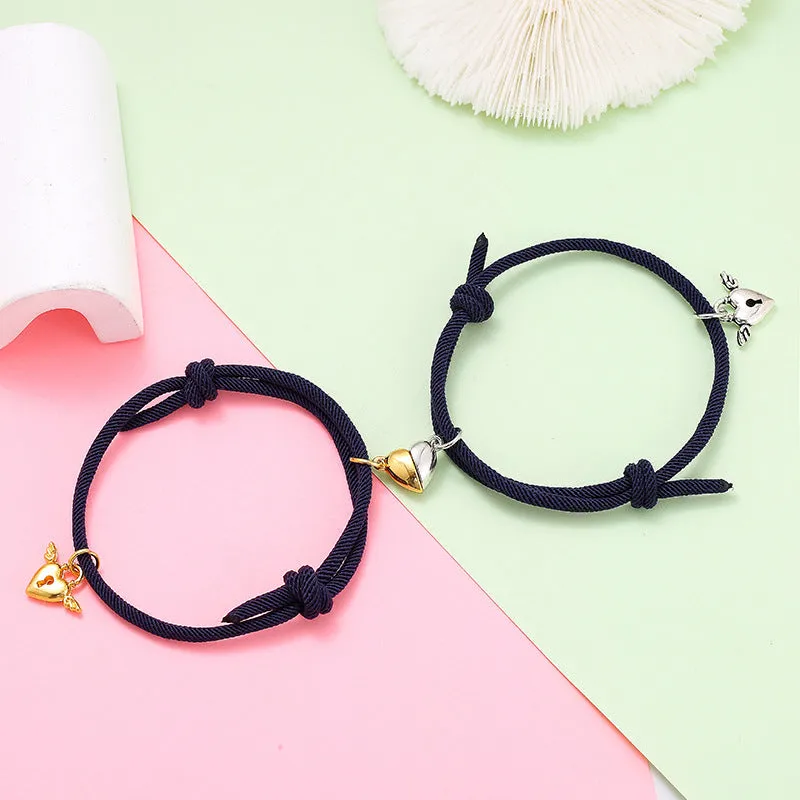 New Love Magnet couple bracelet set, heart-shaped alloy design in black and white, matching pair