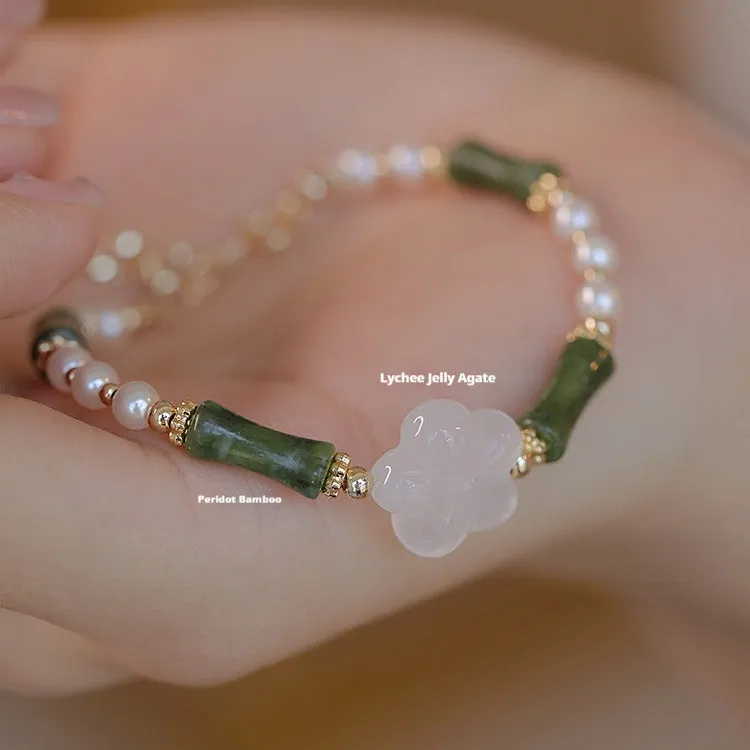 Women's Chinese style Hetian jade bracelet with bamboo joint design and shell pearl beads