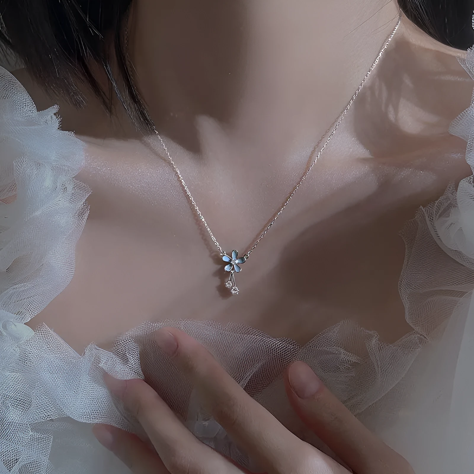 999 sterling silver flower pendant necklace with white nano anti-oxidation finish on adjustable cross chain