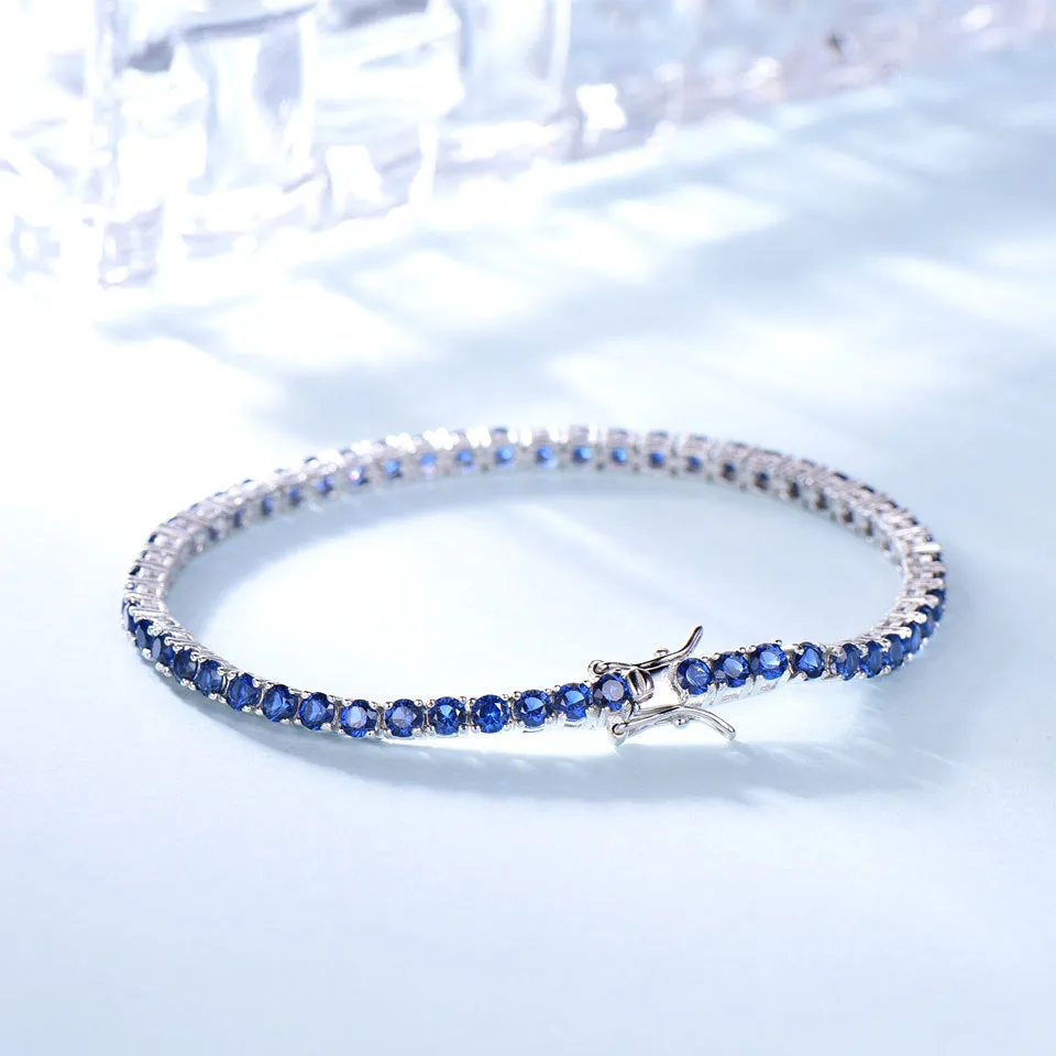 925 sterling silver nano sapphire tennis chain bracelet with drop shape stones on white background