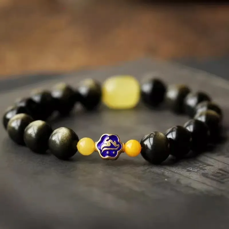 Golden obsidian ethnic bracelet with geometric shape and Chinese zodiac animal charm