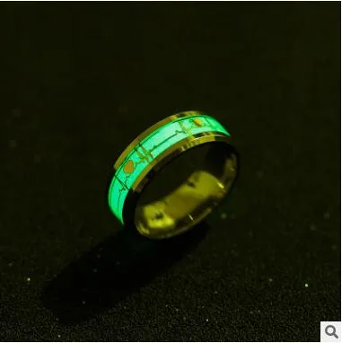 ECG couple carbon fibre ring with luminous glow in heart shape on stainless steel base