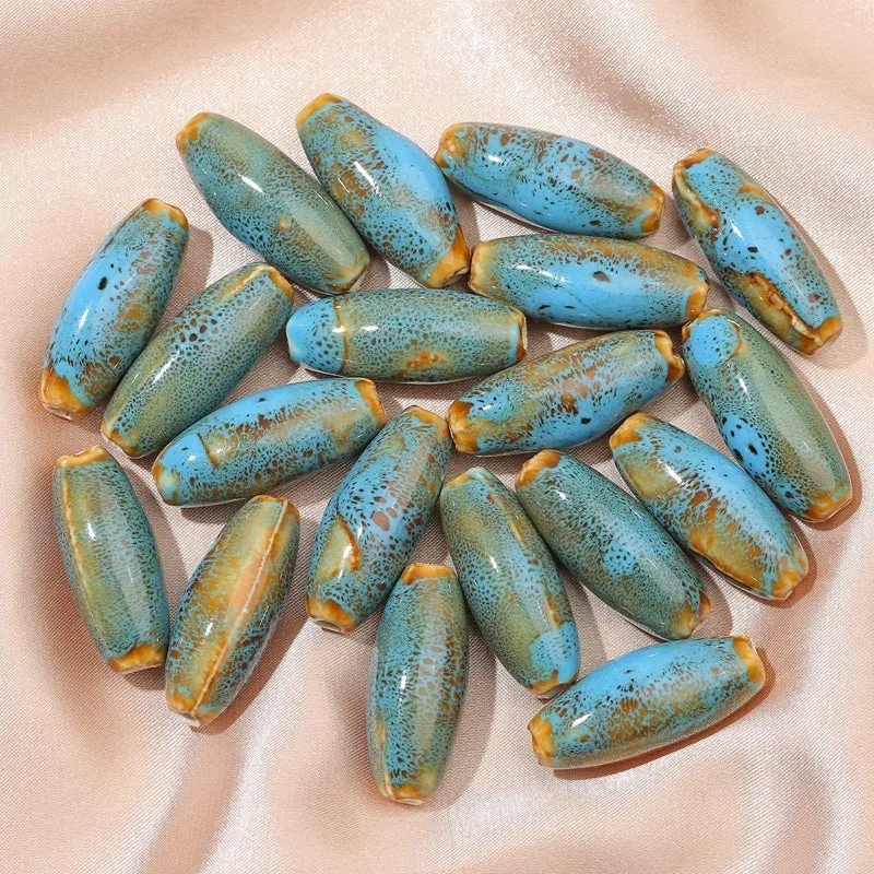 Ceramic bullet beads in seven colours for jewellery making and bracelet braiding