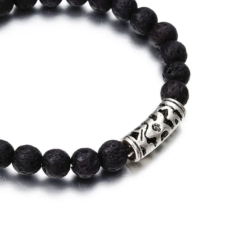 Classic acrylic blue beaded bracelet on wrist showing stretchy cord and smooth round beads