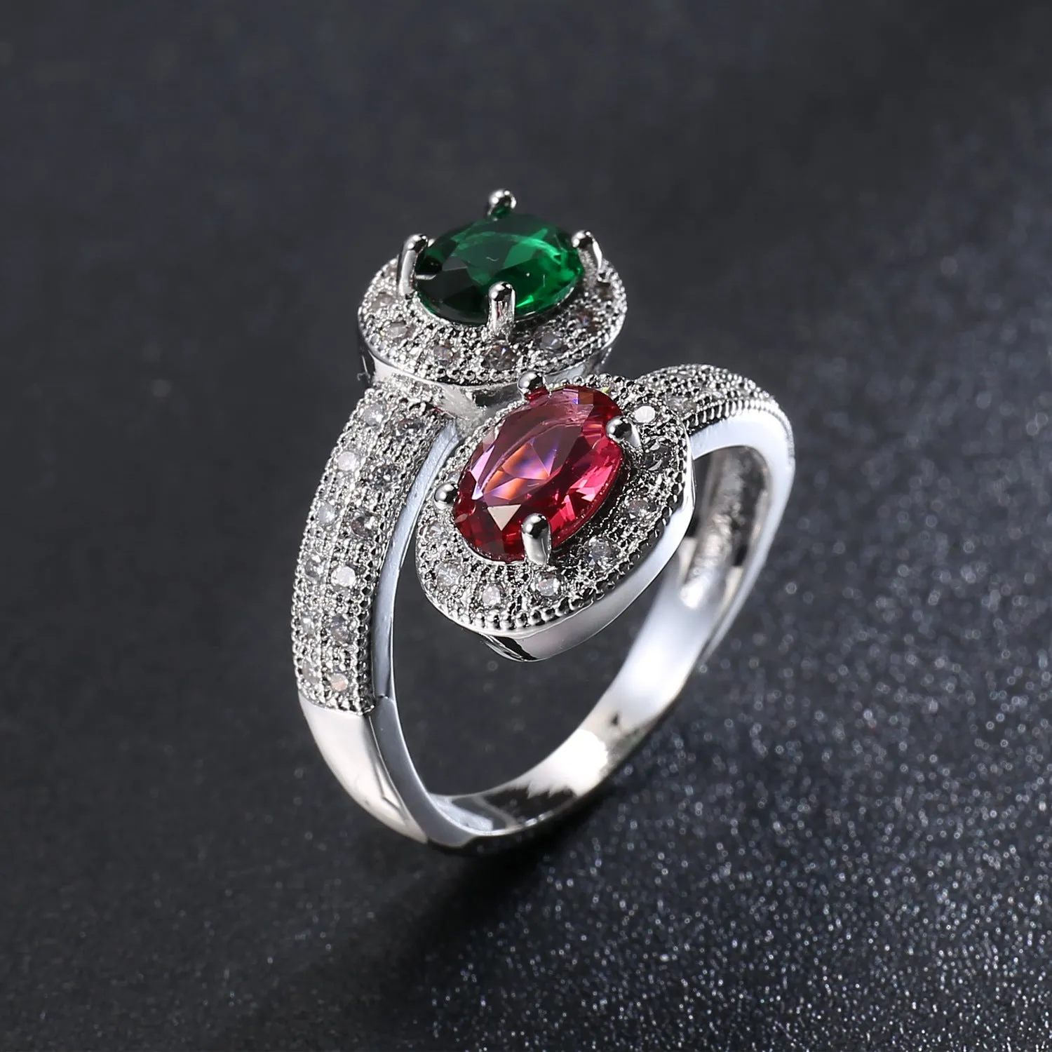 Copper electroplated zircon ring for women in Rose Emerald colour on plain background