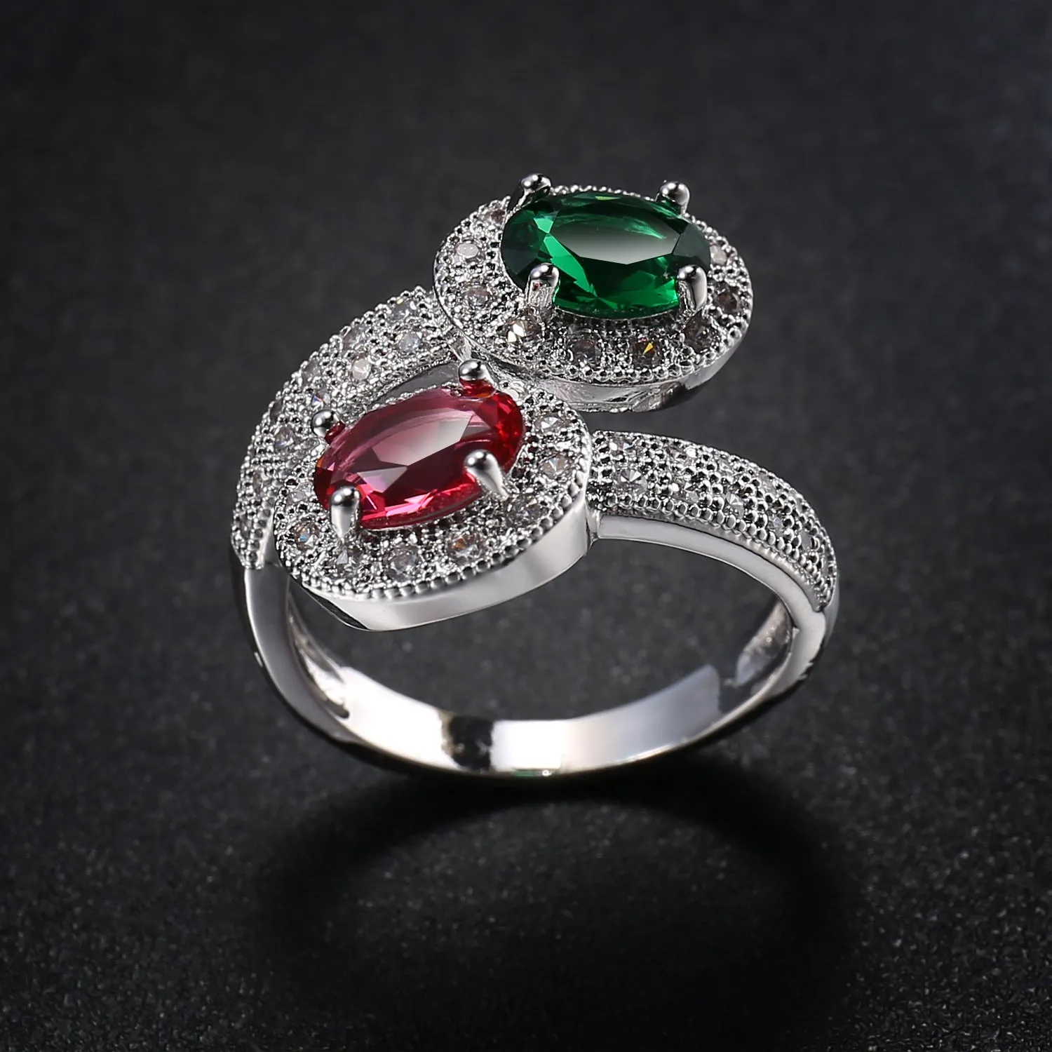 Copper electroplated zircon ring for women in Rose Emerald colour on plain background