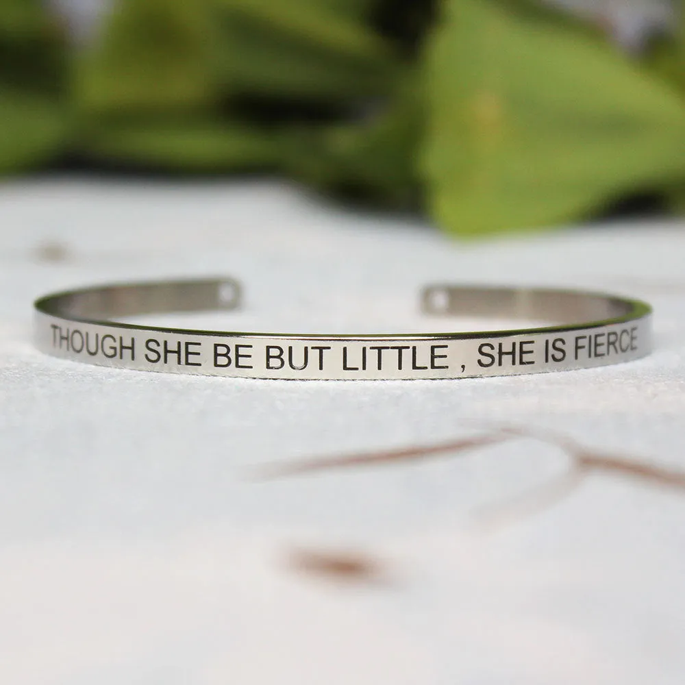 Silver customisable stainless steel bracelet with laser engraved text and adjustable fit on neutral background
