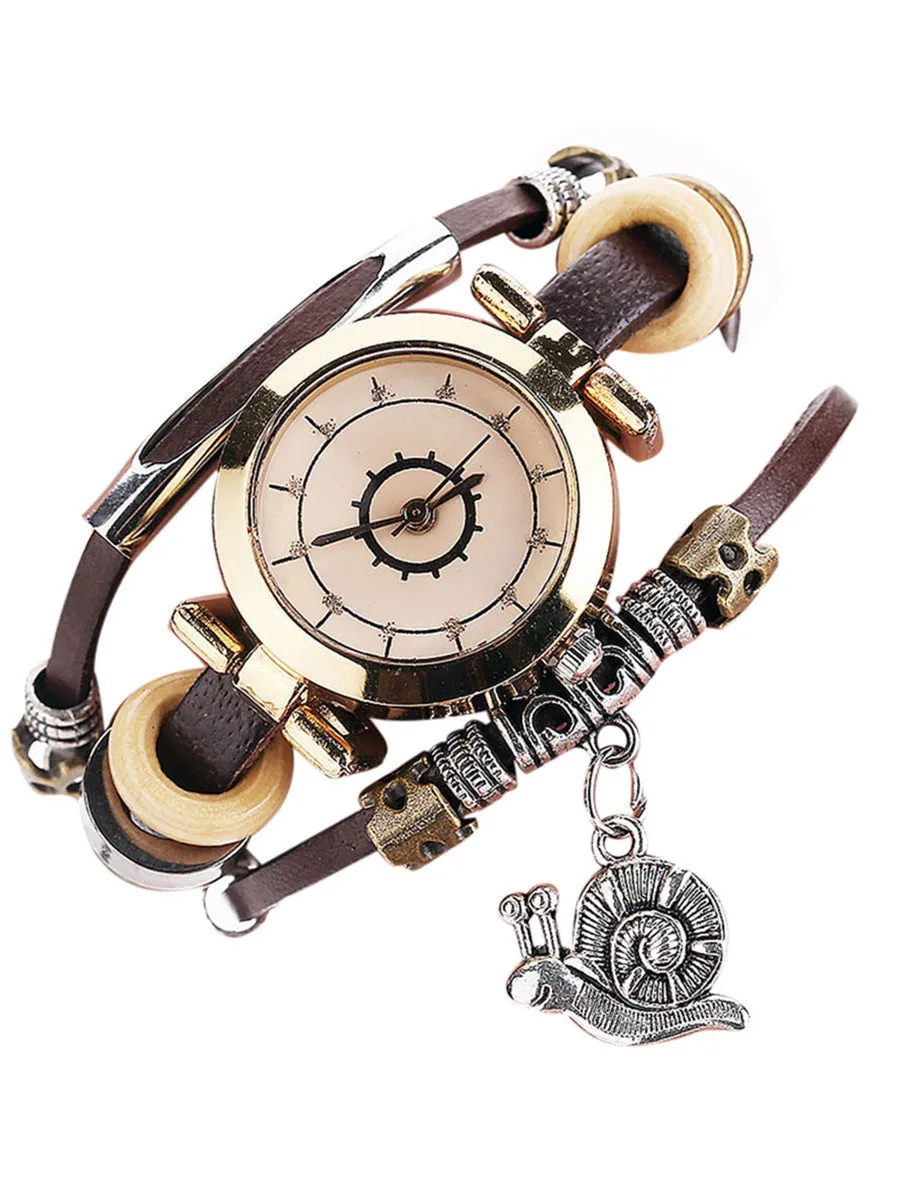 Women's vintage bracelet watch with coiling leather strap and snail pendant in Mori style