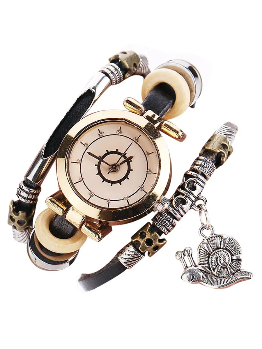Women's vintage bracelet watch with coiling leather strap and snail pendant in Mori style