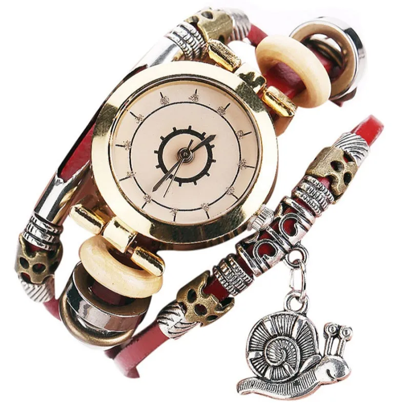 Women's vintage bracelet watch with coiling leather strap and snail pendant in Mori style