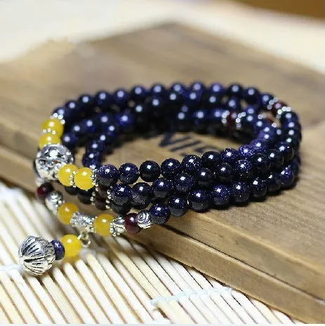 Handmade blue San bead bracelet showing 6mm beads in ethnic style unisex design