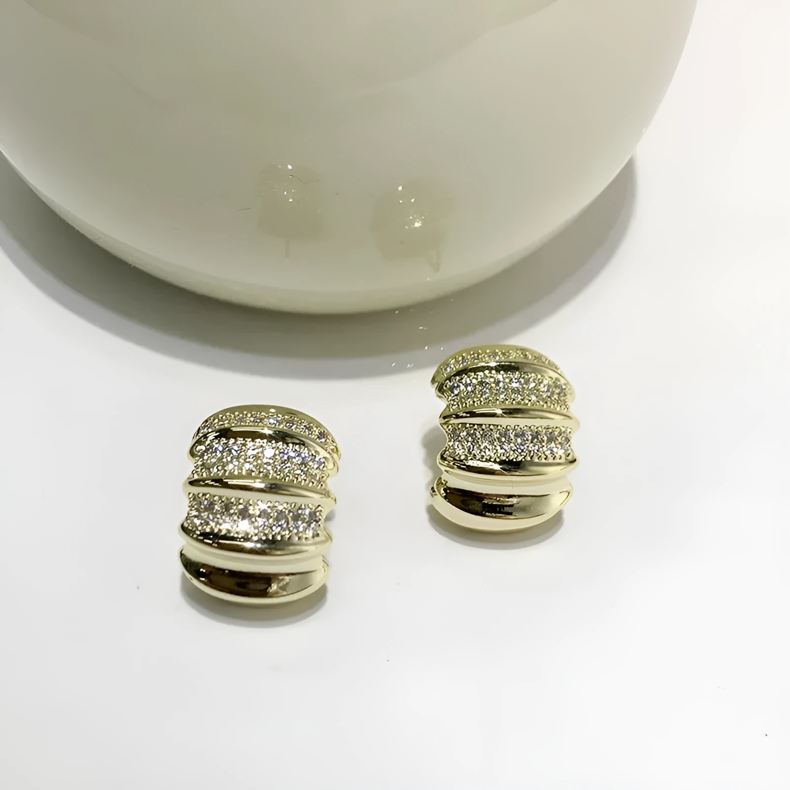 Minimally irregular geometric metal stud earrings in silver finish with 2.5cm drop