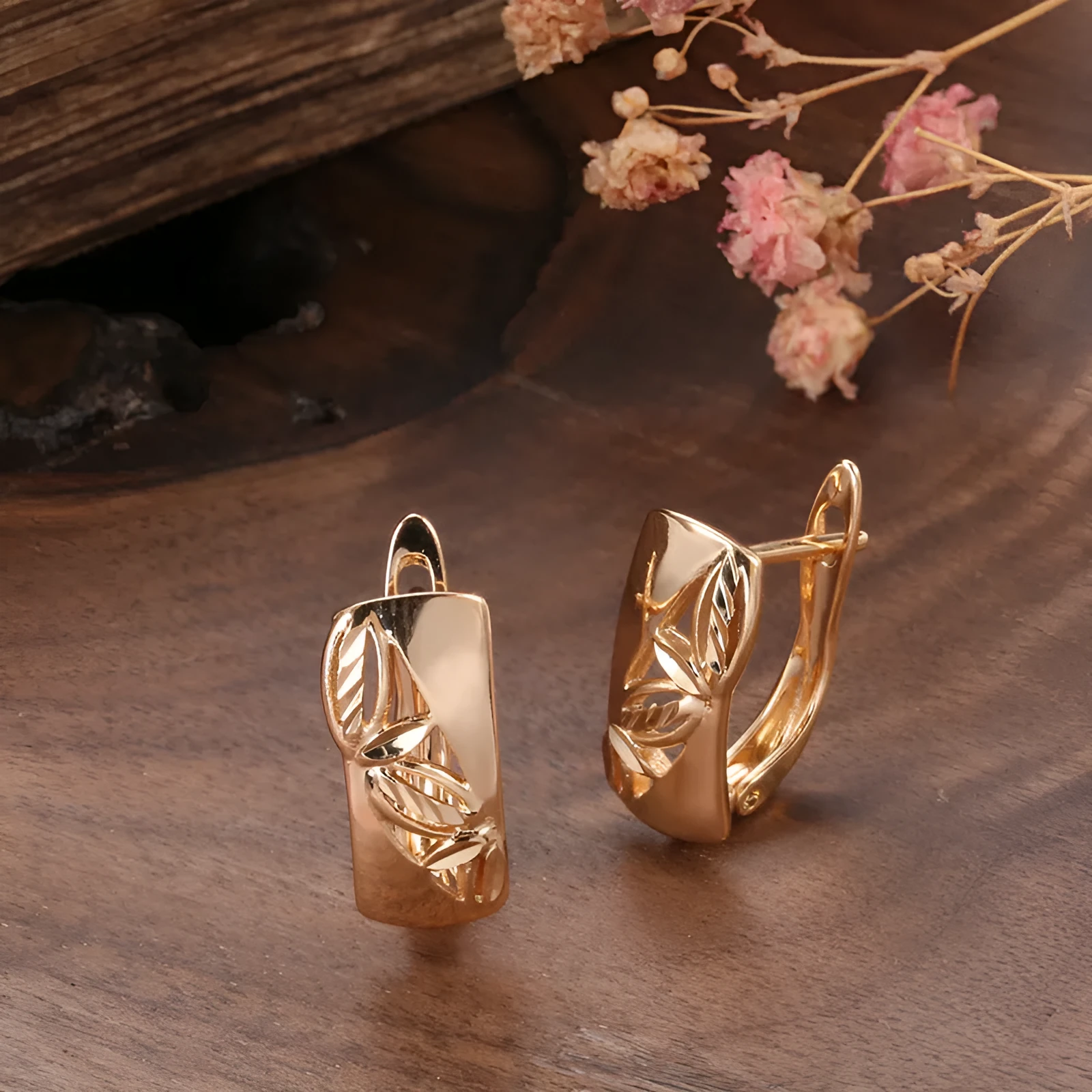 Hollow-carved floral copper earrings with smooth surface and U-shaped design in H0147 colour