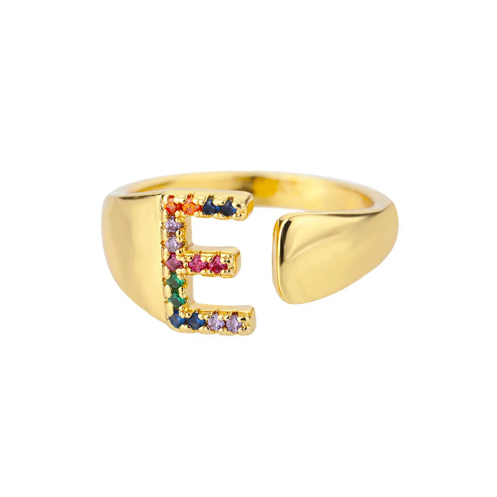 Fashion micro-set colored zirconium adjustable open ring showing letter A on a copper electroplated base