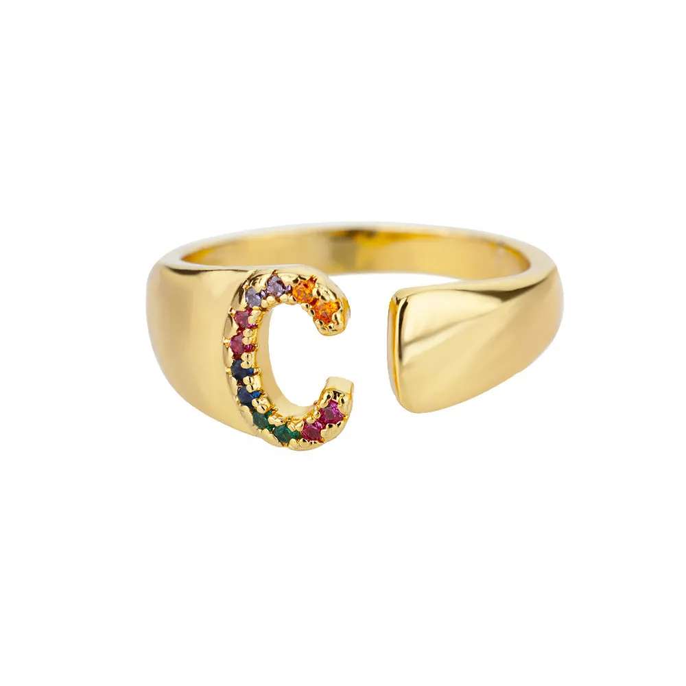 Fashion micro-set colored zirconium adjustable open ring showing letter A on a copper electroplated base