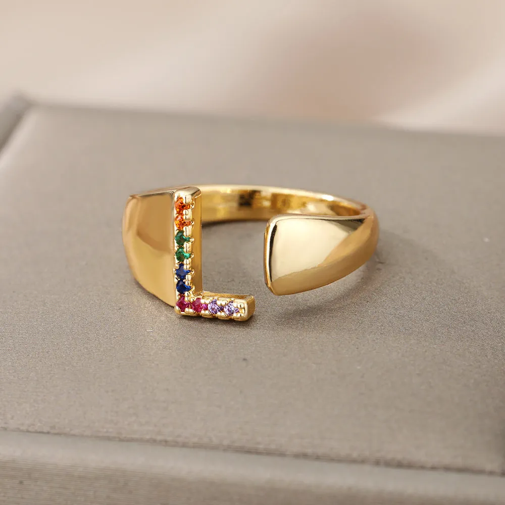 Fashion micro-set colored zirconium adjustable open ring showing letter A on a copper electroplated base