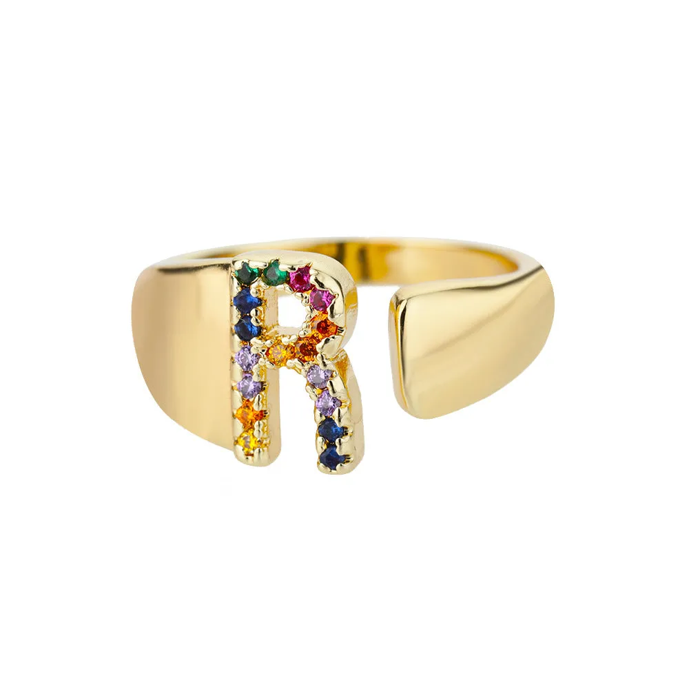 Fashion micro-set colored zirconium adjustable open ring showing letter A on a copper electroplated base