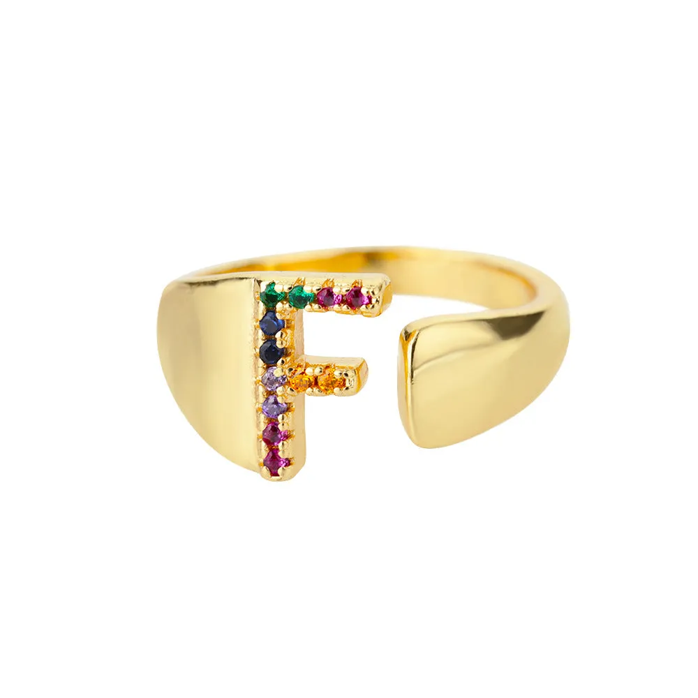 Fashion micro-set colored zirconium adjustable open ring showing letter A on a copper electroplated base