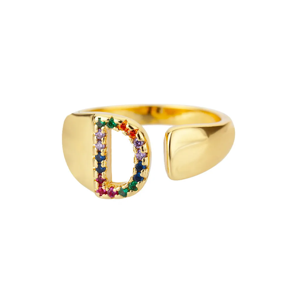 Fashion micro-set colored zirconium adjustable open ring showing letter A on a copper electroplated base