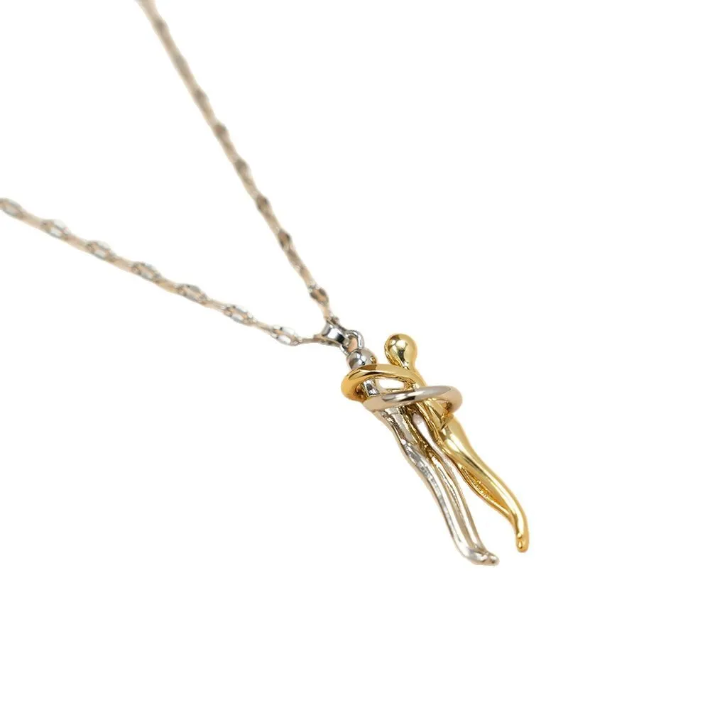 Couple hugging bronze pendant necklace on unisex stainless steel chain with gold lip chain finish, casual style